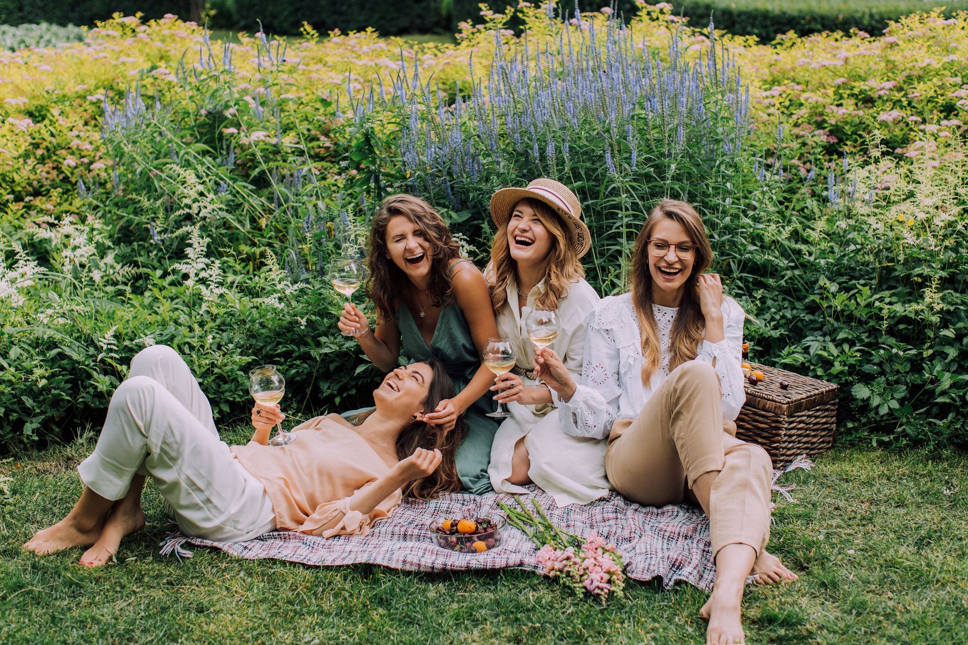 Women smiling outdoors representing healthy hormone balance, energy, and wellness.