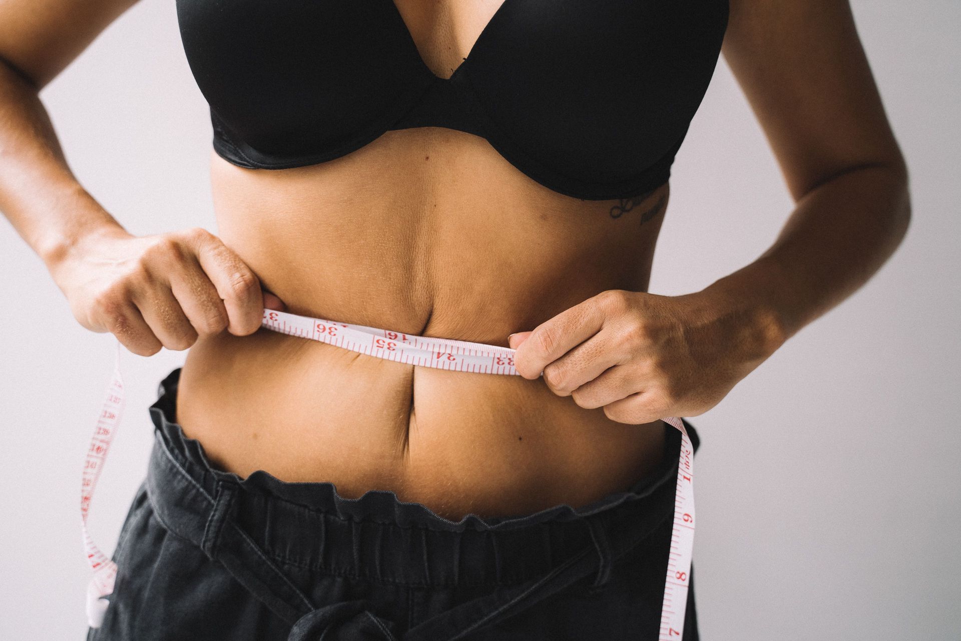 Medical provider discussing semaglutide weight loss plateau and sustainable GLP-1 treatment with pat