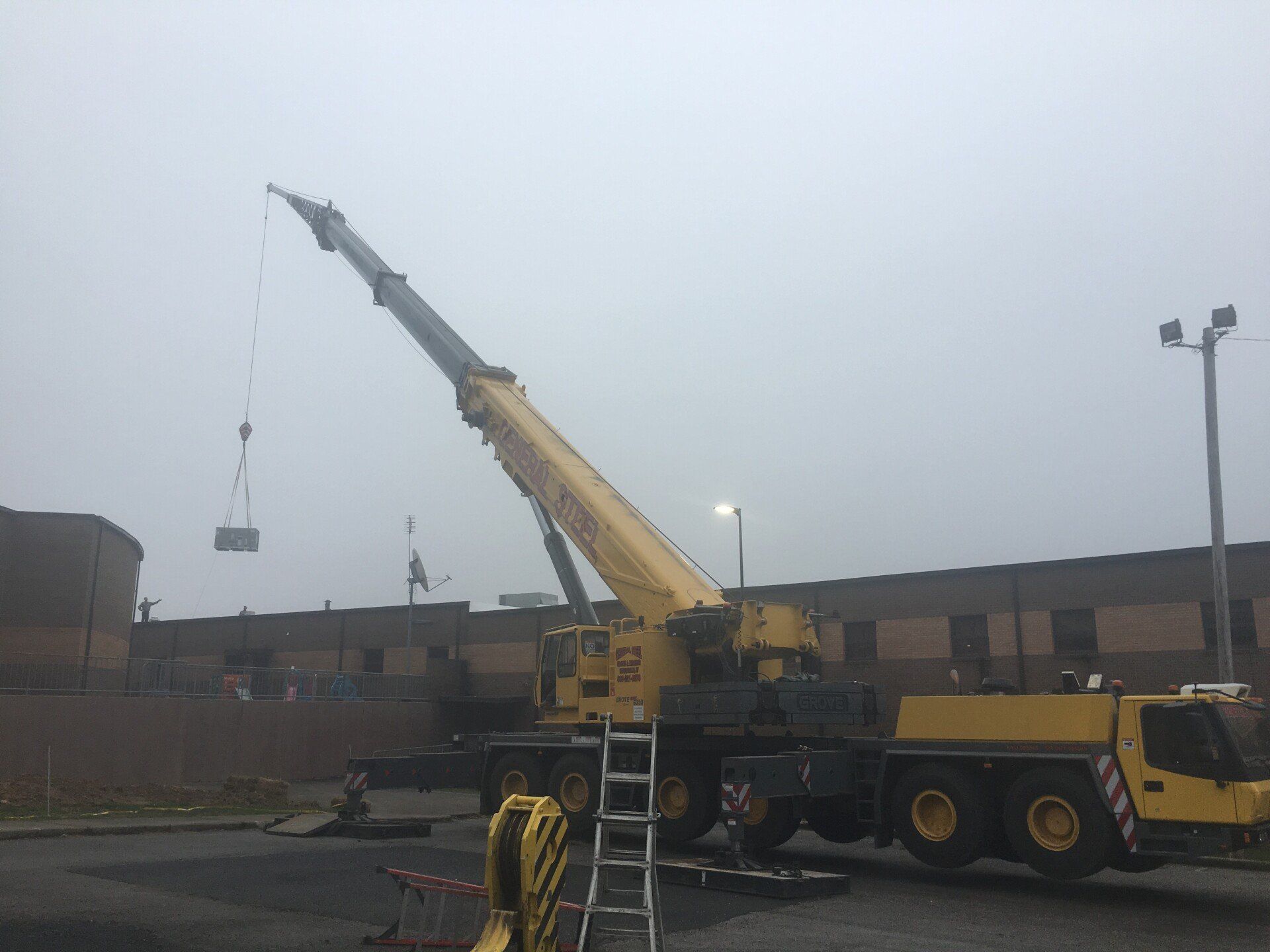 Setting RTU at Butler Co. High — Owensboro, KY — Hagerman Plumbing & Heating