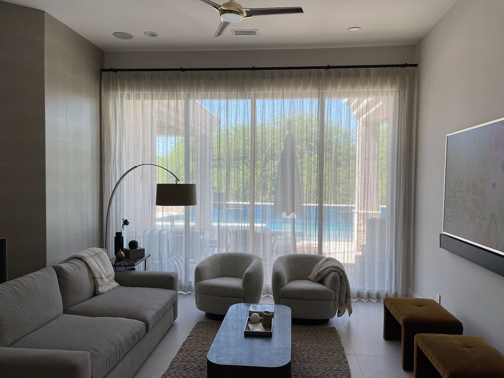 Sheer curtains in tv room