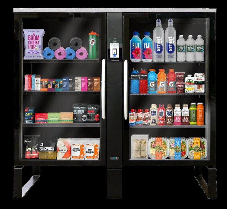 Two glass-front snack and drink vending machines stocked with colorful beverages and snacks