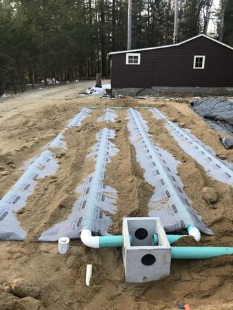 Blue Pipe — Northwood, NH — Tasker MD Construction Blue Pipe — Northwood, NH — Tasker MD Construction