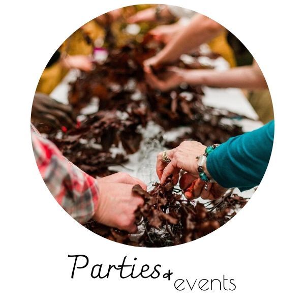Hands arranging dark leaves on a table, with “Parties + events” text below.