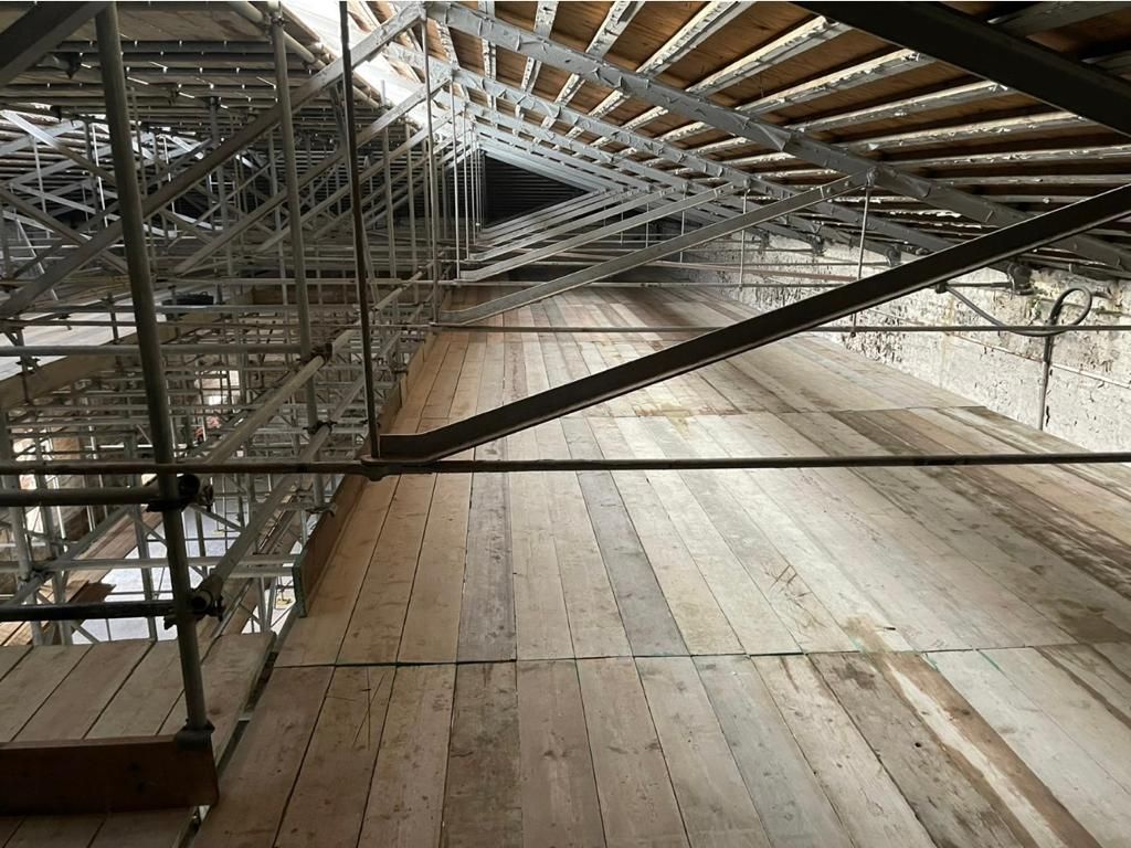 warehouse commercial building repair scaffolding
