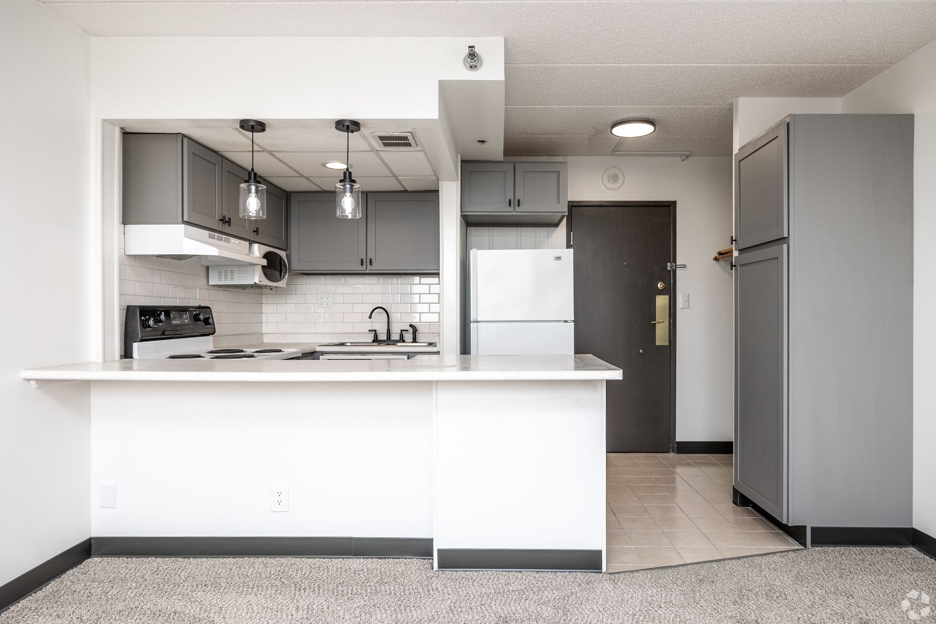 The McCoy @ 8035 Apartments For Rent Renovated Kitchen and Storage Areas