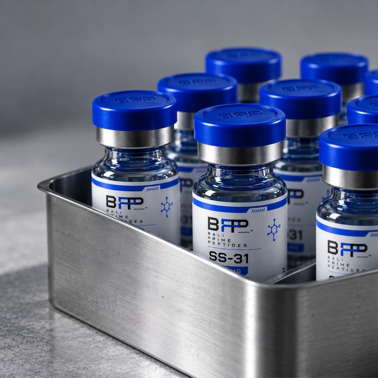 Glass peptide vials on a lab tray with tropical light