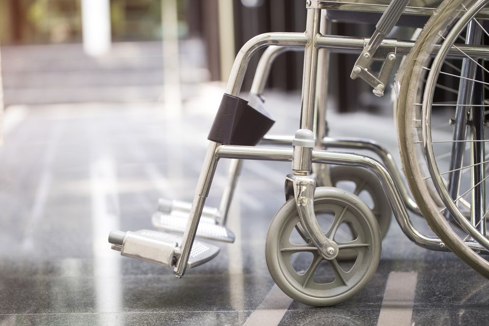 Close Up View of Stainless Wheelchair — Gold Coast Linen Hire in Tugun, QLD