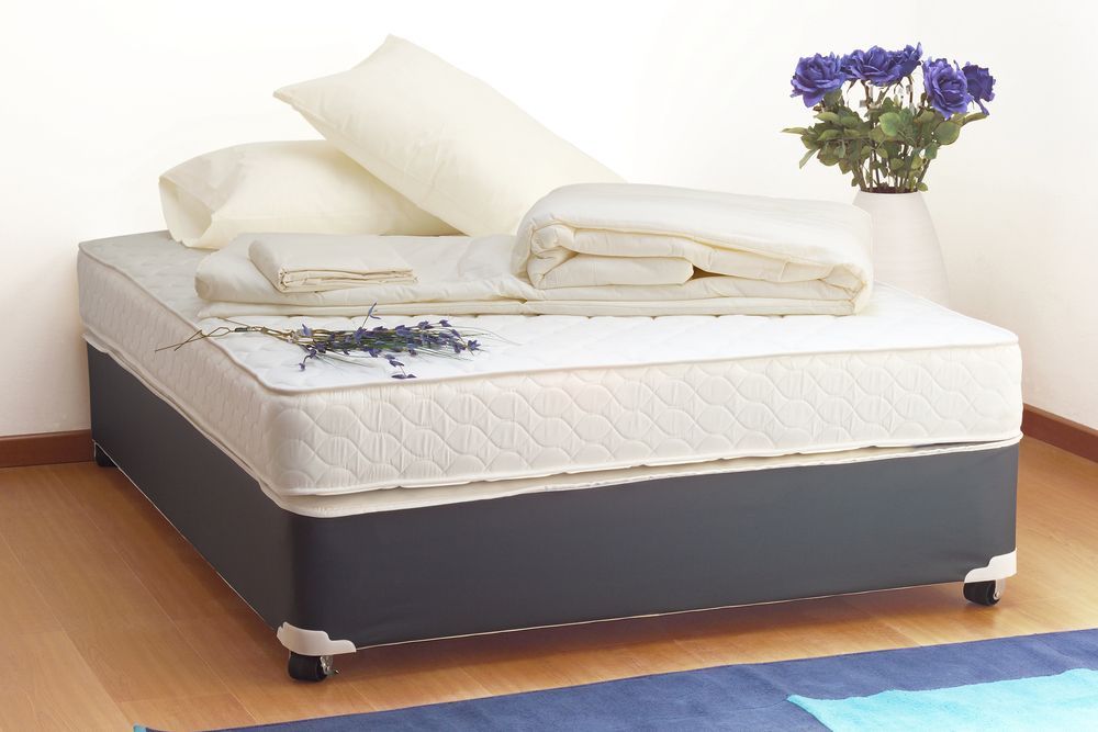 Purple Roses Beside the Double Bed Mattress — Gold Coast Linen Hire in Tugun, QLD