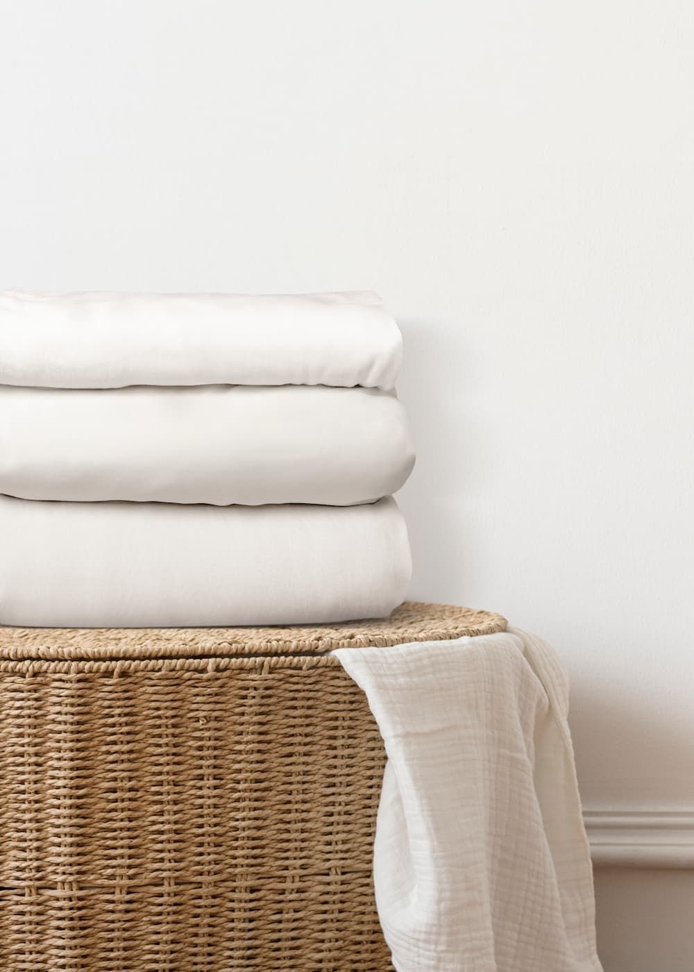 Folded Blankets Stored on Top of the Laundry Basket — Gold Coast Linen Hire in Tugun, QLD