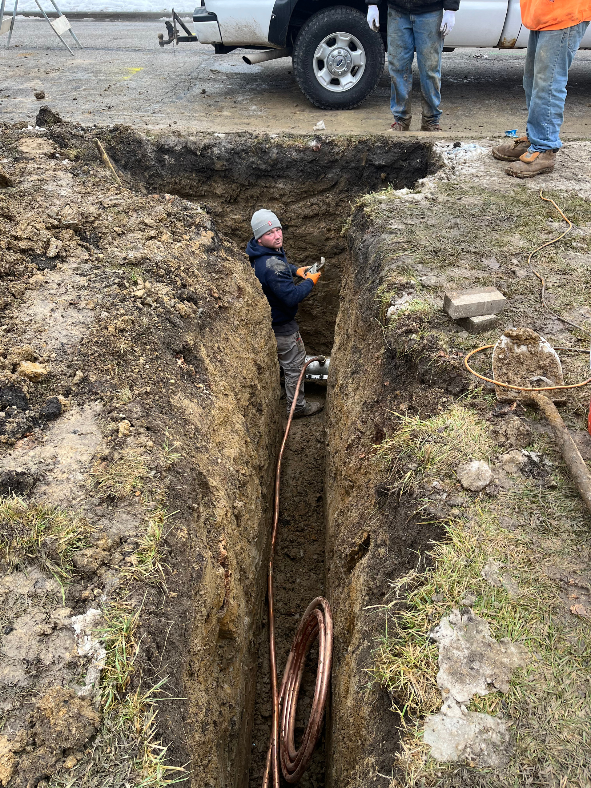 PLACEHOLDER — replace with real photo of lead service pipe vs. copper pipe at job site.