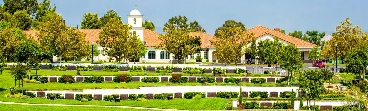 Queen of Heaven Our Lady's Serenity Garden with Mortuary in background