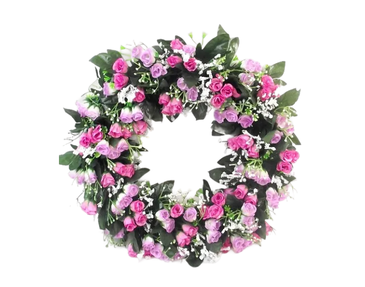 Pink and white floral wreath on a white background