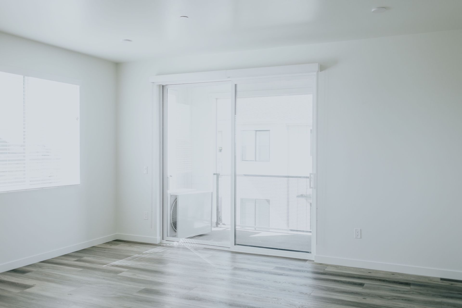 living room with patio door to balcony