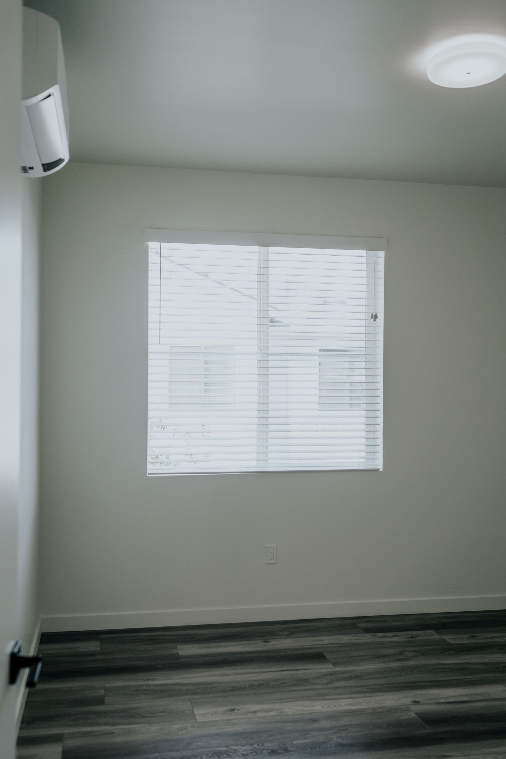 bedroom view with window