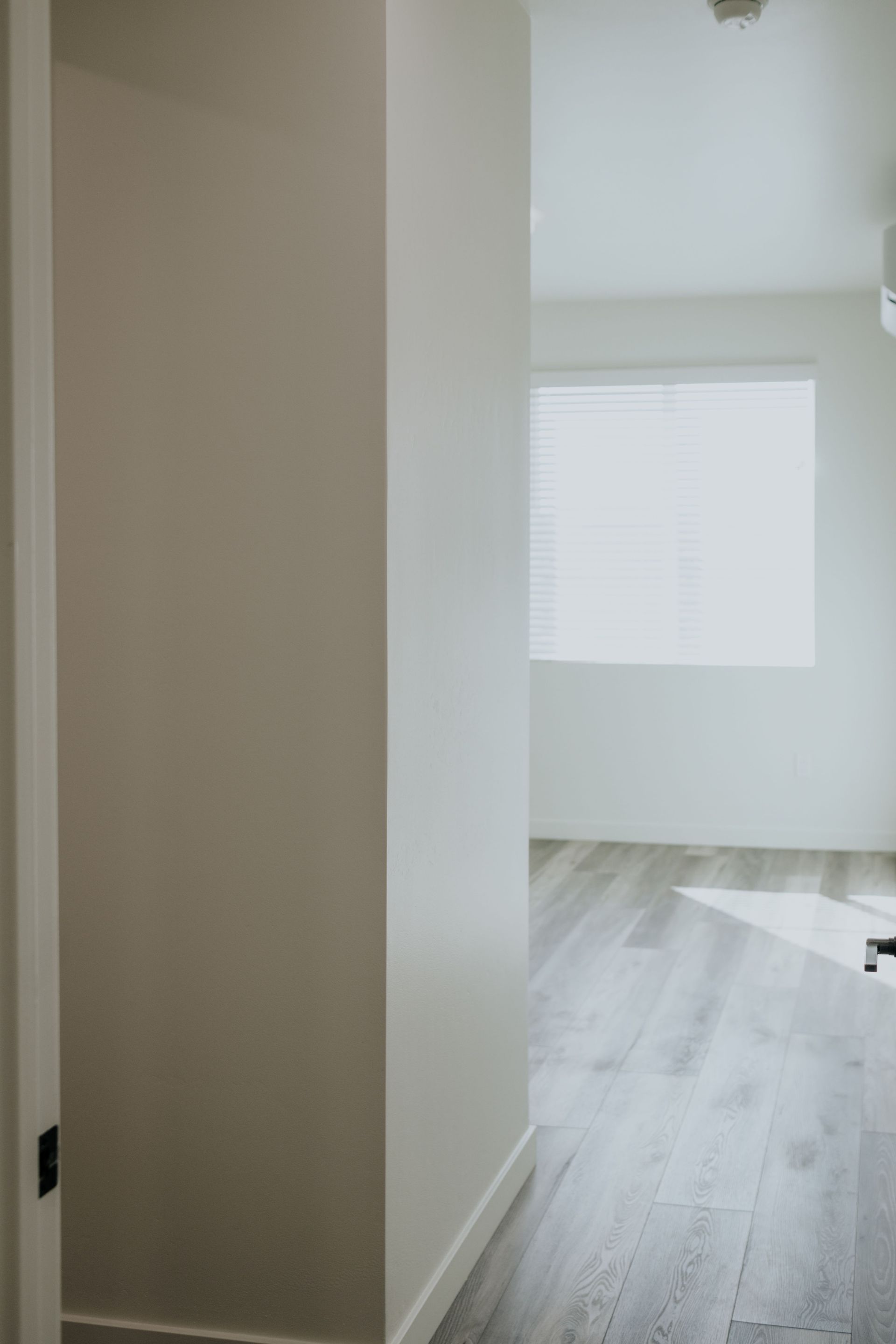 bedroom entry with door to bathroom