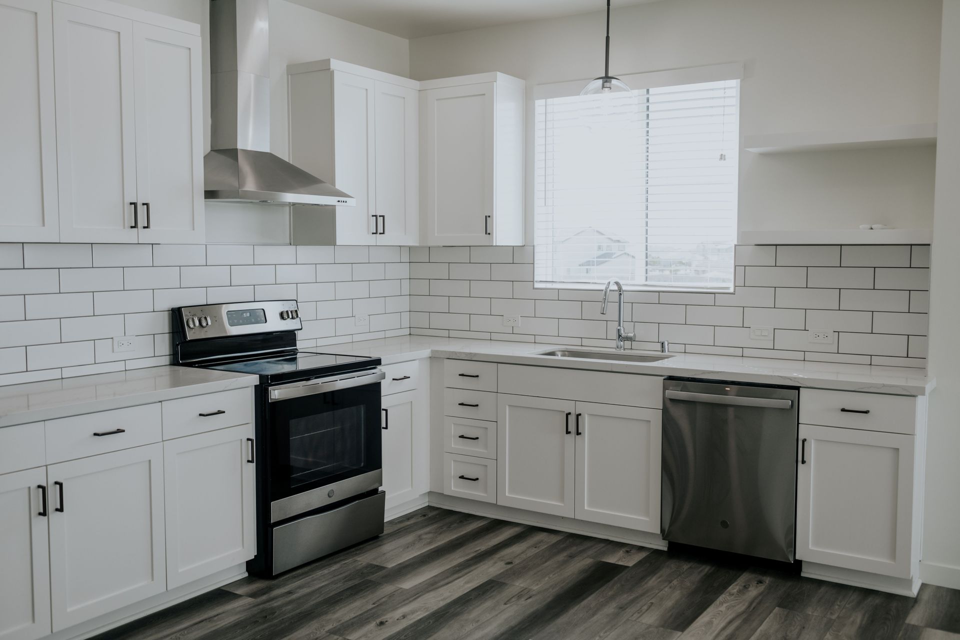 kitchen with stainless steel stove and dishwasher 