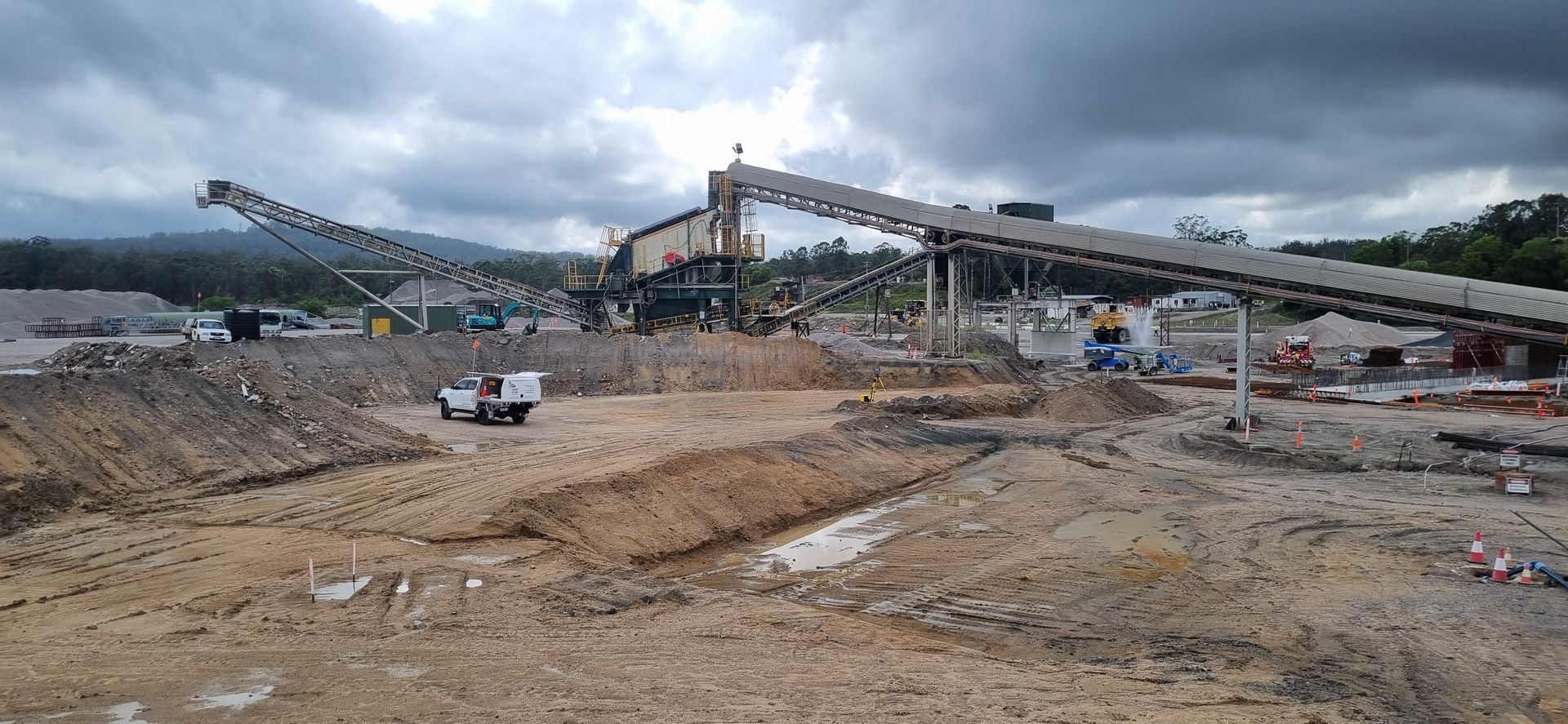 Industrial Site With Conveyor Belts and Machinery — Next Step Surveying in Ipswich, QLD
