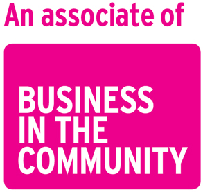 A pink sign that says an associate of business in the community