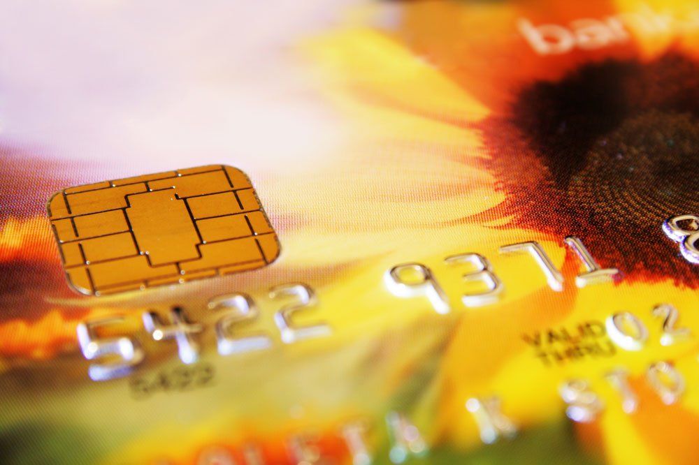 A close up of a credit card with the number 54232371 on it