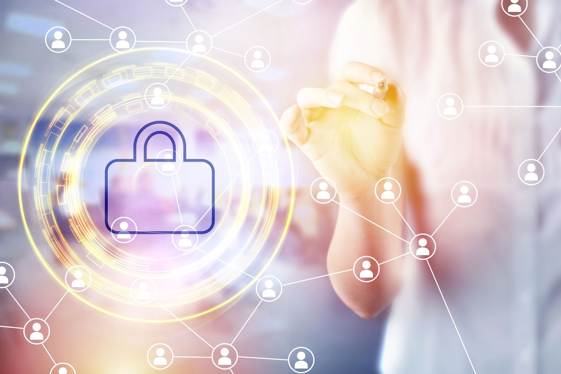 A person is holding a padlock icon in their hand.