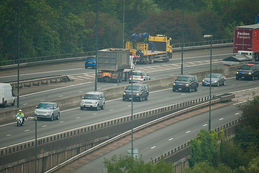 The President of the United States of America and Prime Minister David Cameron (both in the fourth vehicle along), returning to the Celtic Manor Resort, along the M4, Newport, Wales.