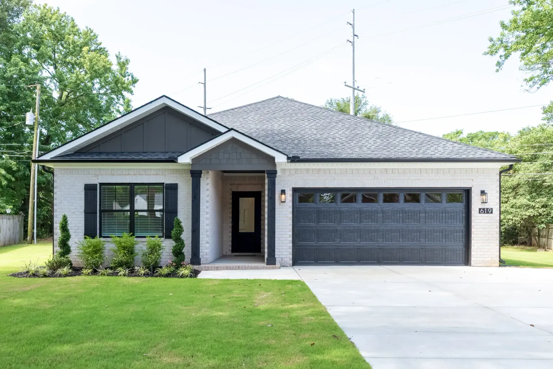 Top-down 3D apartment floor plan with labeled rooms, wood floors, and garage with two cars.
