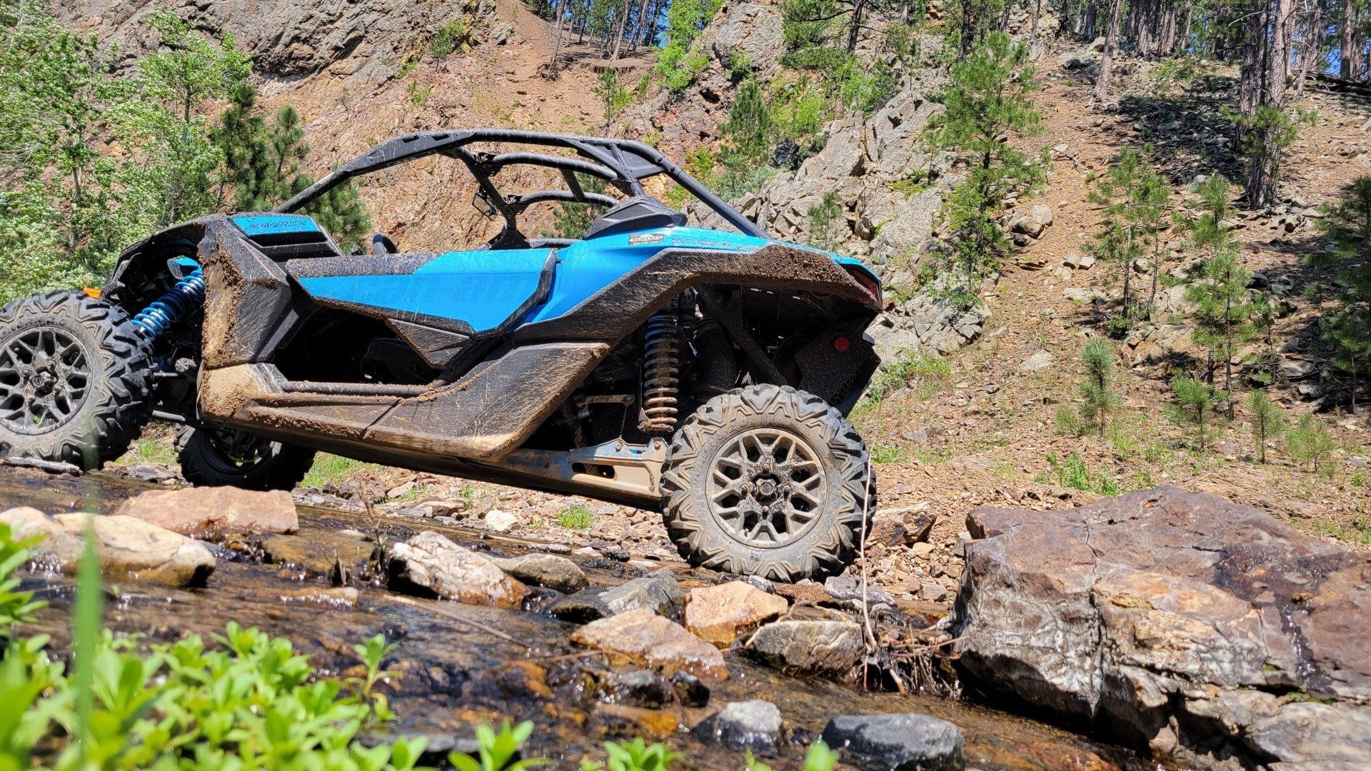 UTV crossing a river