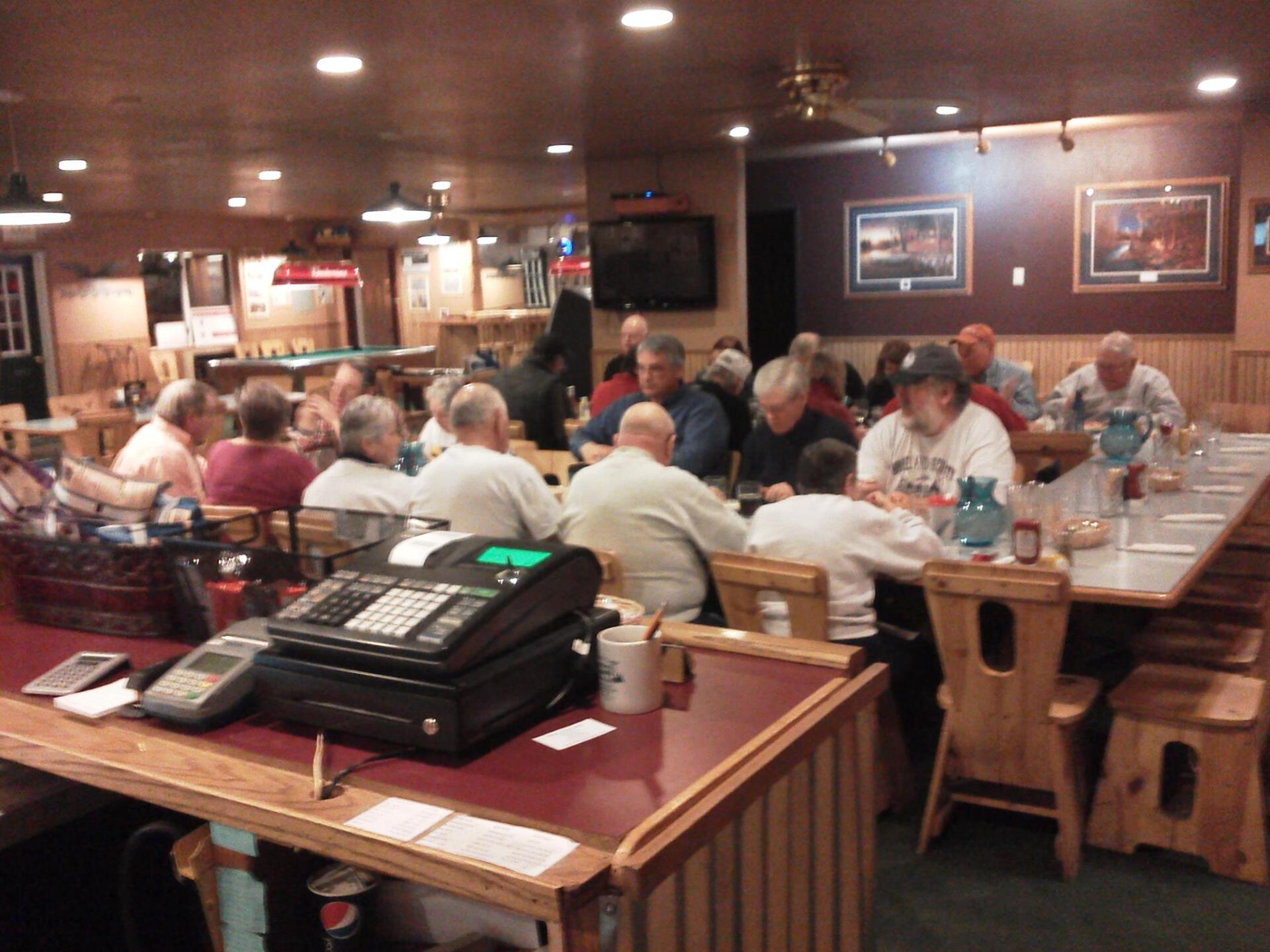 Customers on a a restaurant eating