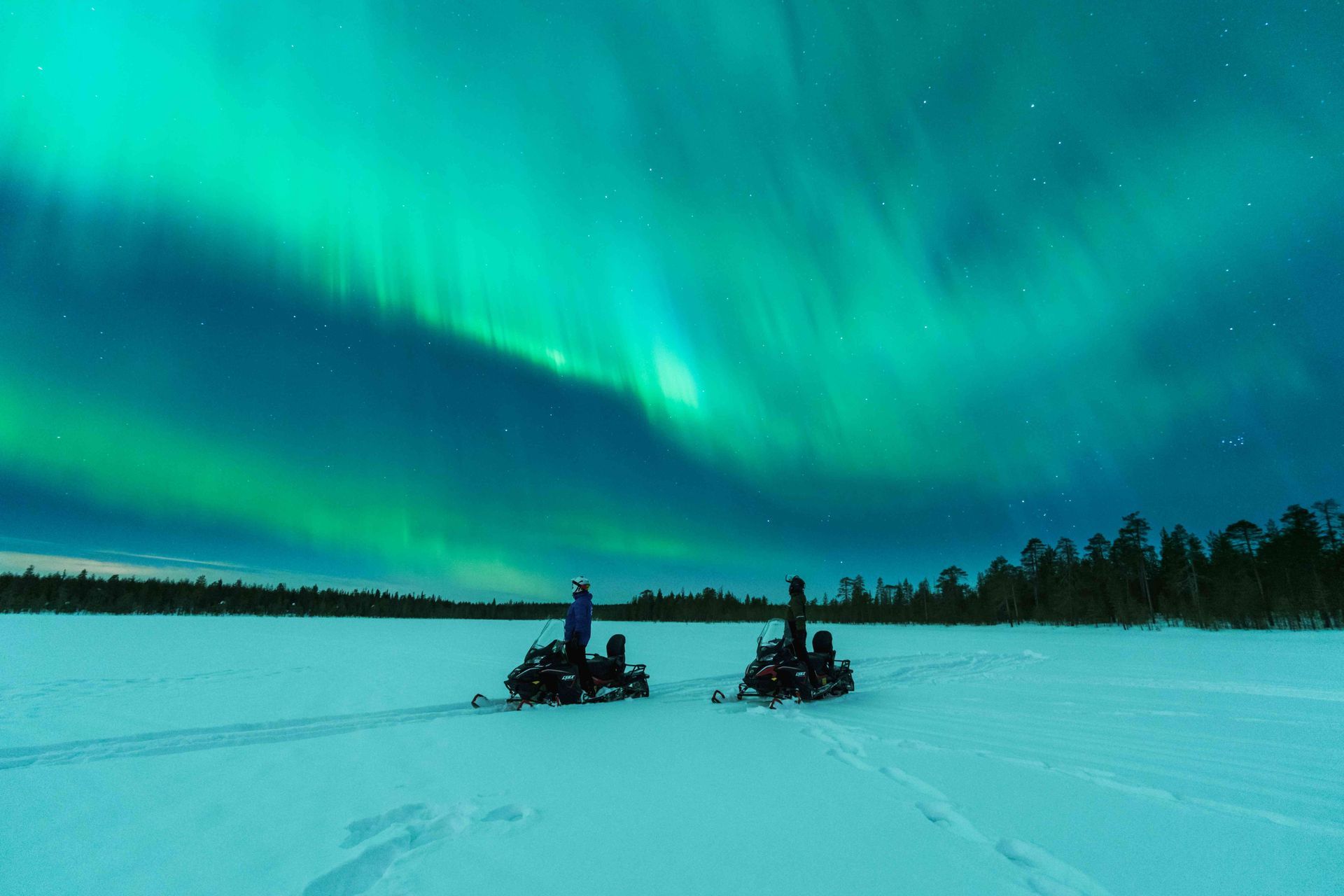 Riding snowmobile on Northern Light