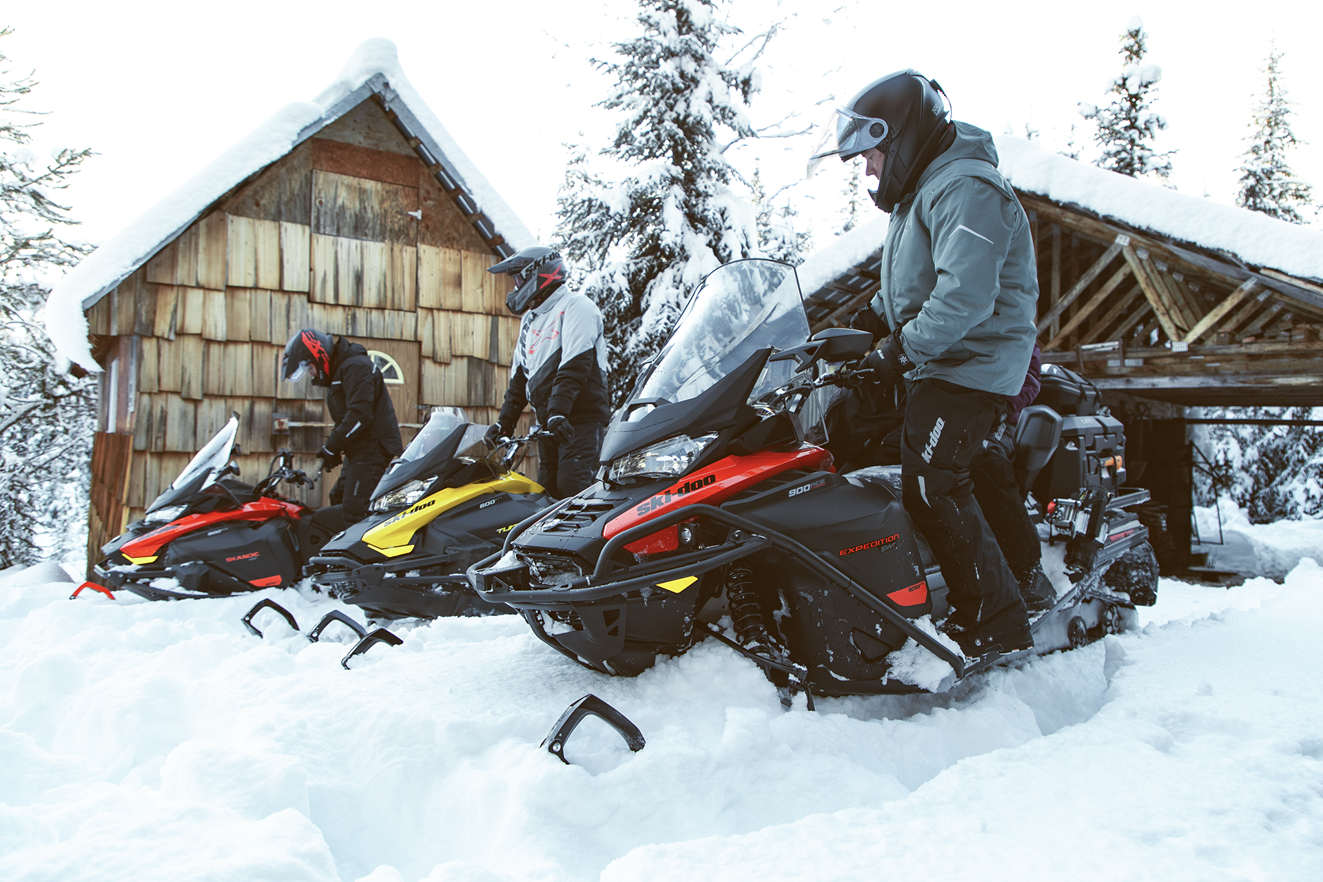 Snowmobile enthusiasts preparing for their ride