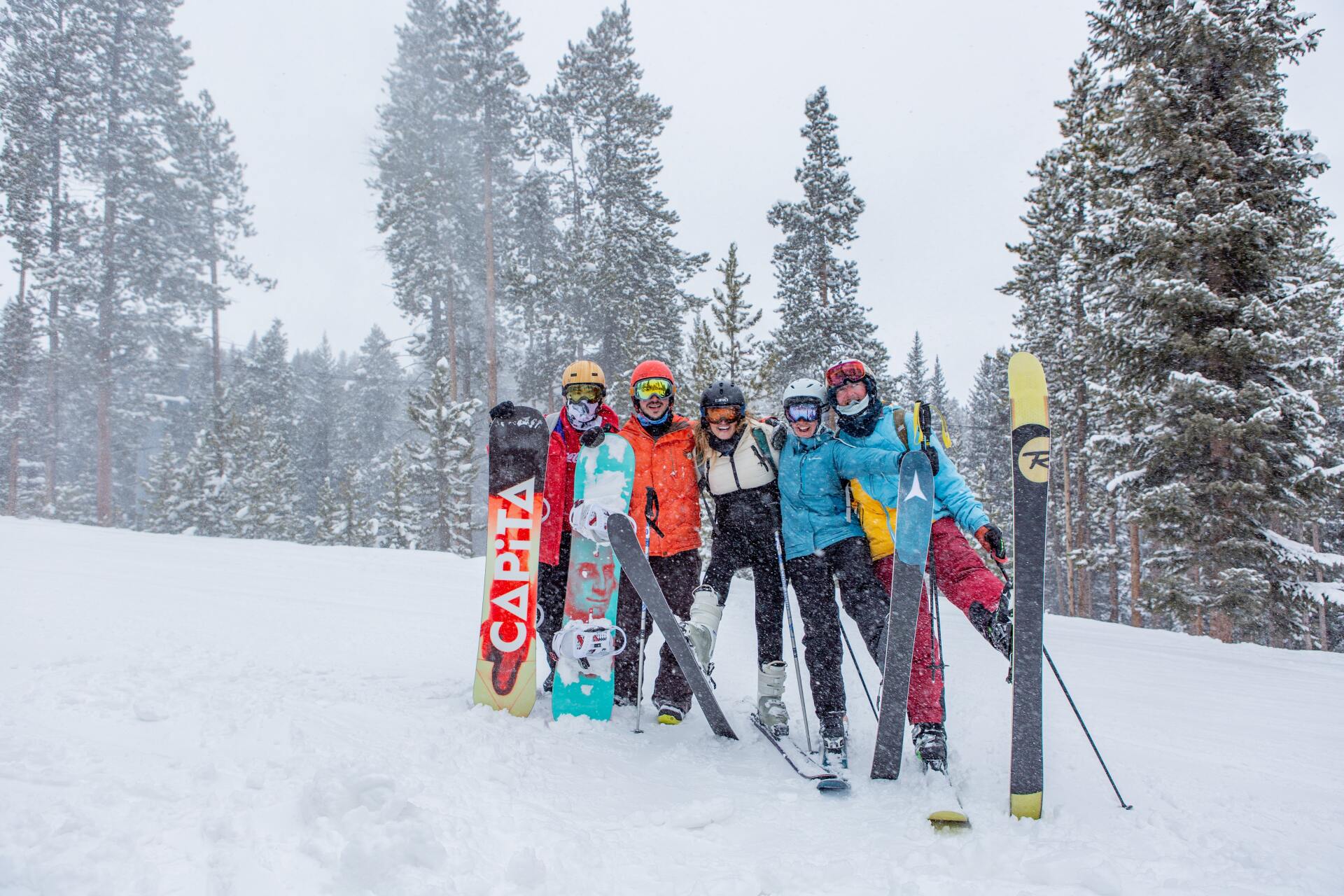 Skier's smiling for a photo