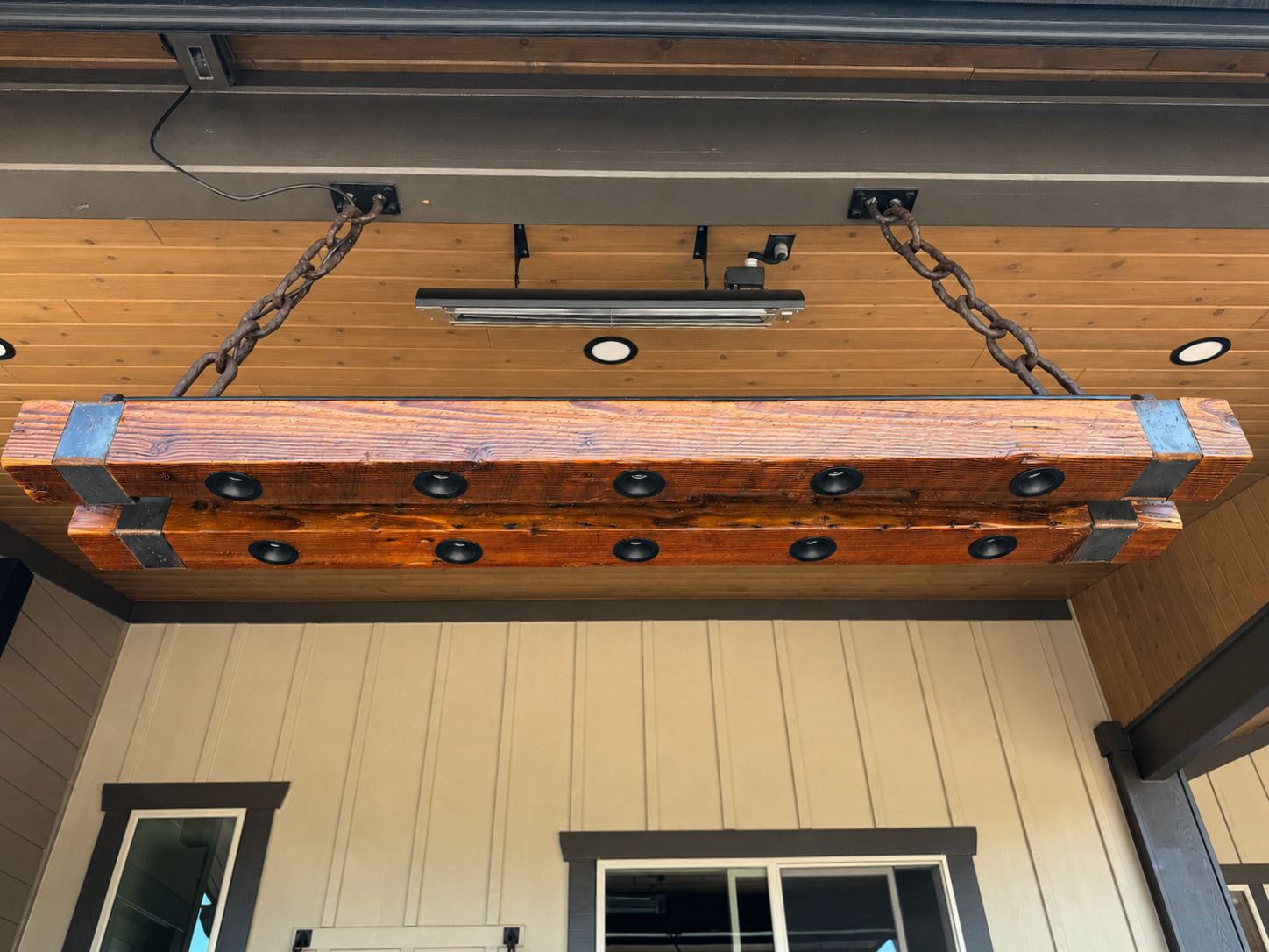 Custom reclaimed barn-wood light fixture with hand-forged chains