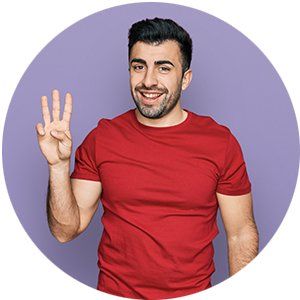 Man holding up the number 3 with his hand