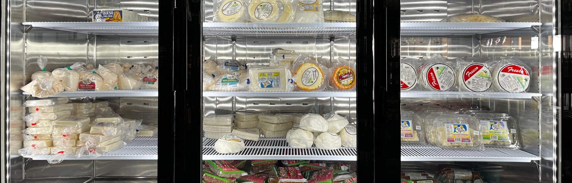 A refrigerator filled with lots of food and drinks.