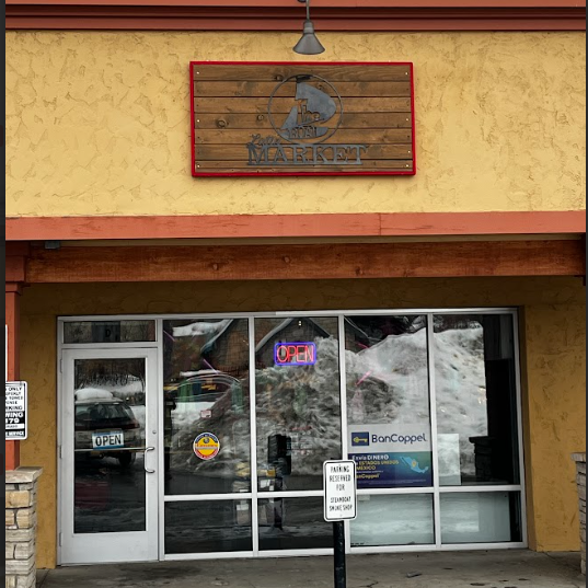 The front of a store with a sign that says ' the secret ' on it