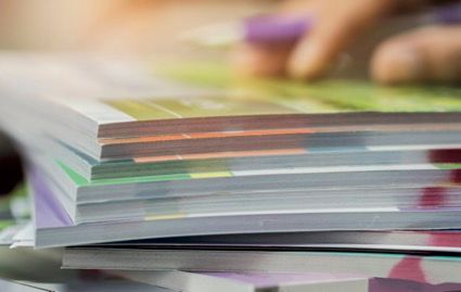 A Stack Of Books — Classic Design & Print in Svensson Heights, QLD