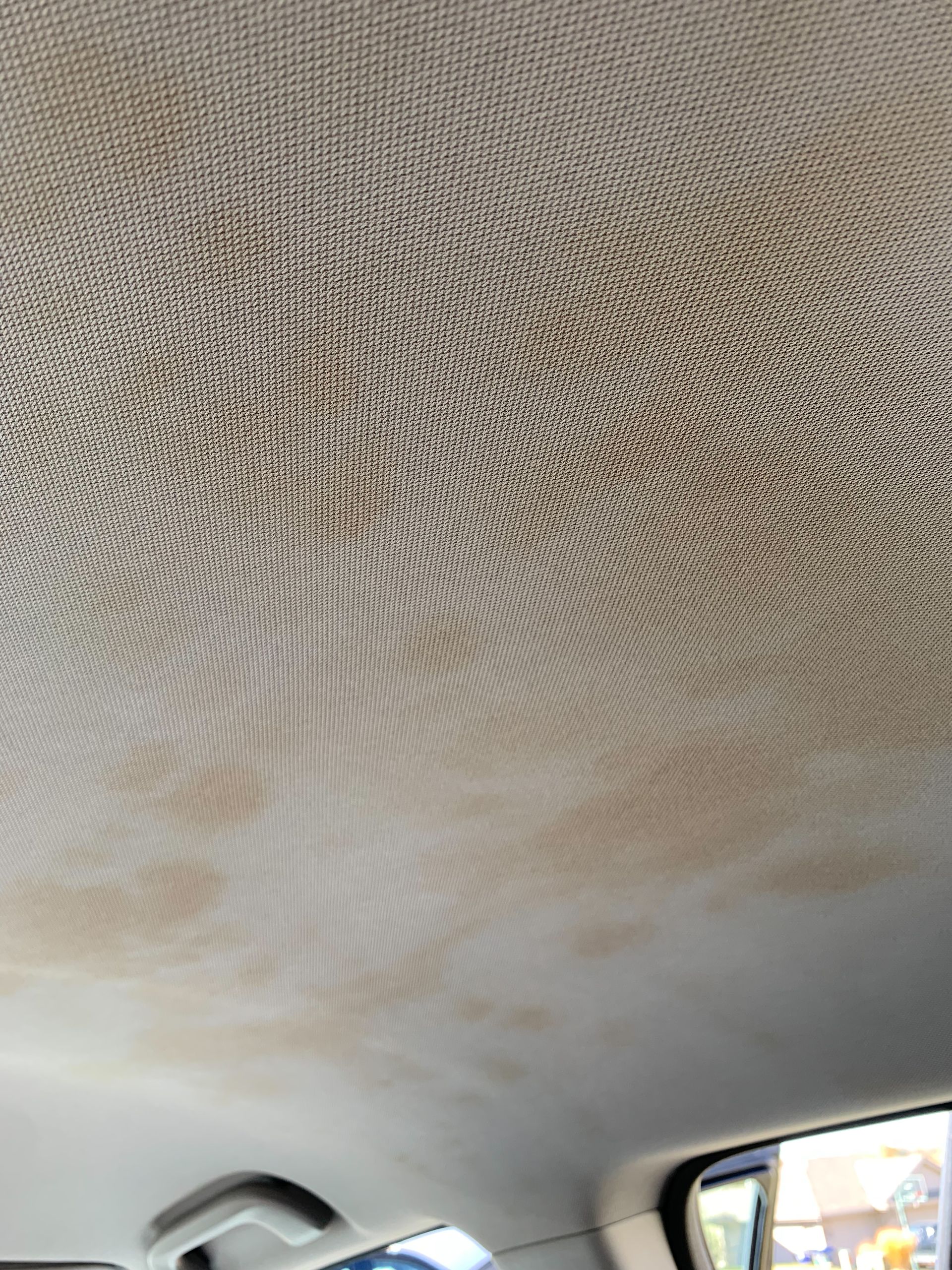 A close up of the ceiling of a car.