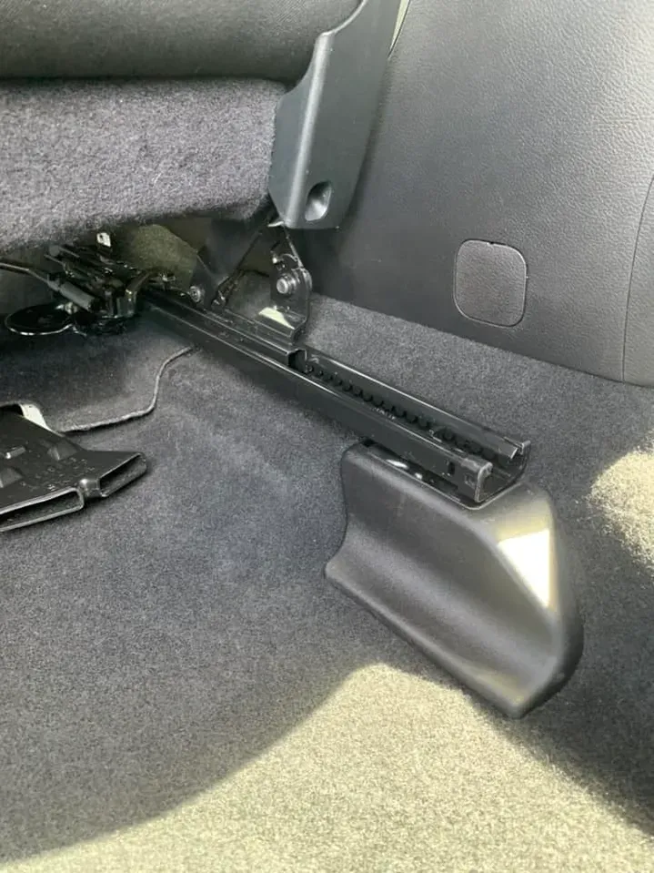 A close up of the back seat of a car.