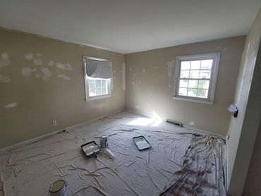 Drywall repair service in progress. 
