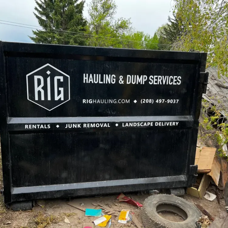 a large black rig dumpster