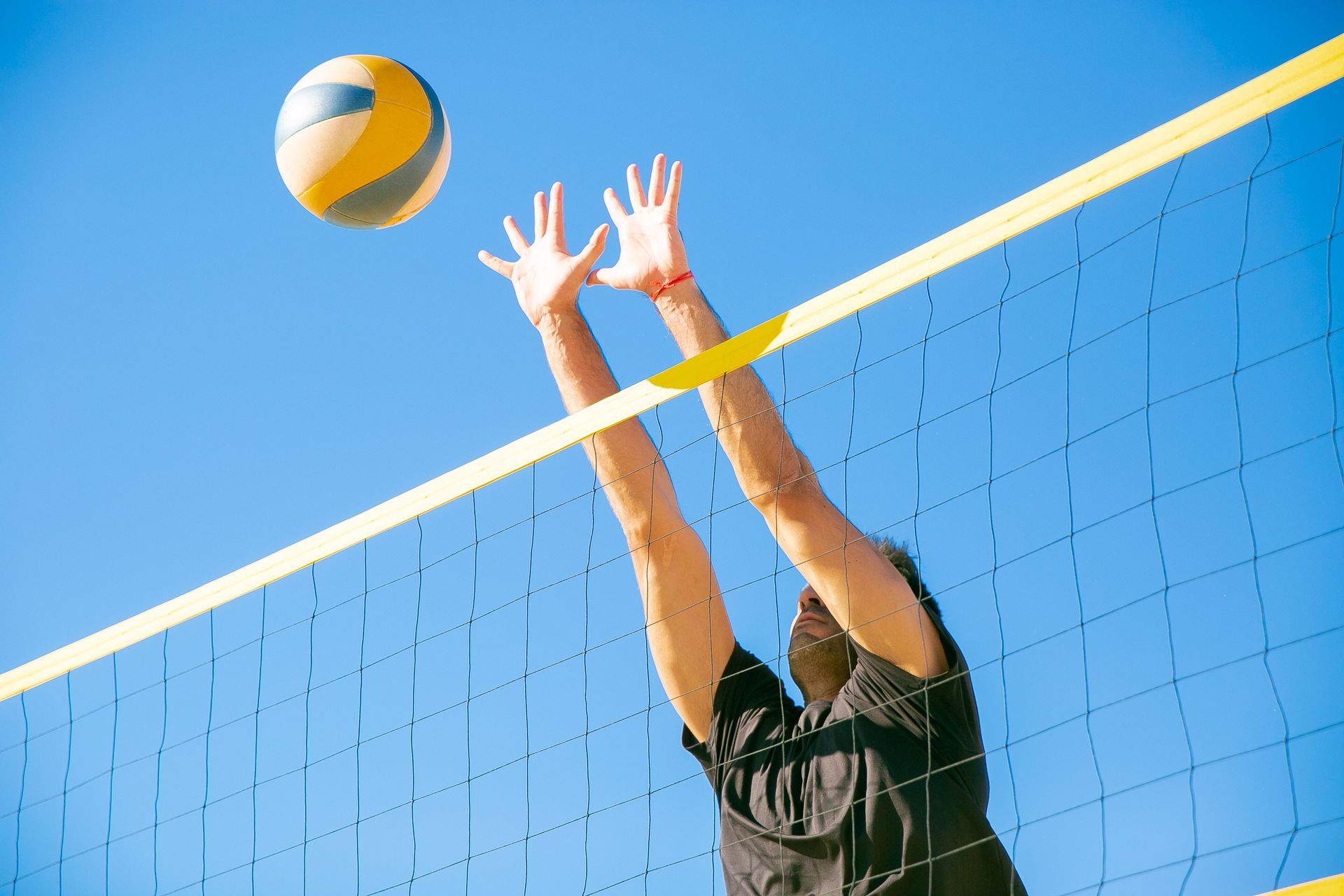 Volleyball Block — treated at Franklin Lakes Chiropractic and Sports Medicine