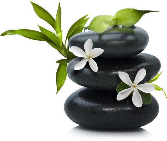 Stacked black spa stones with green leaves and white flowers