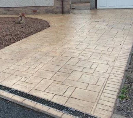 Buff pattern imprinted concrete driveway in Rotherham