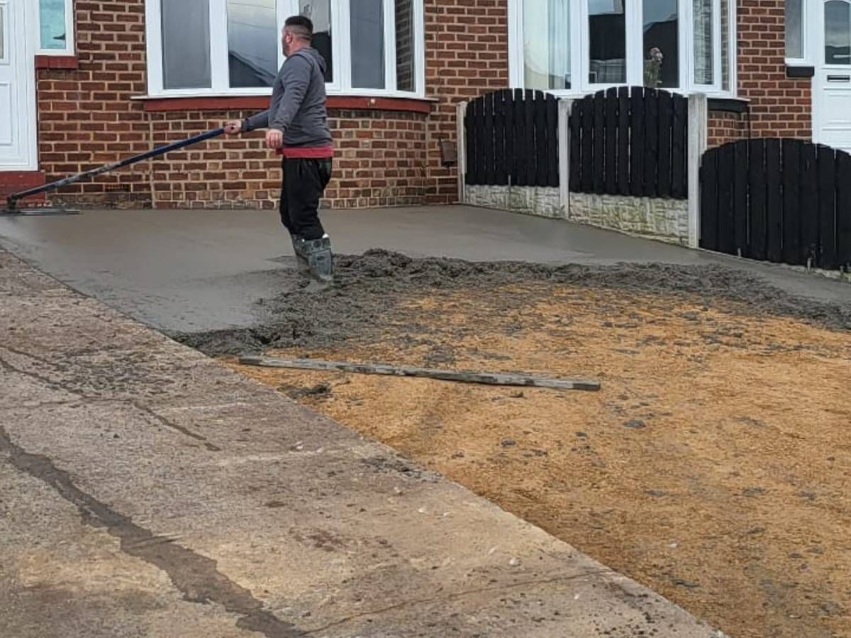 Driveways Rotherham concrete being poured for a driveway in Whiston Rotherham