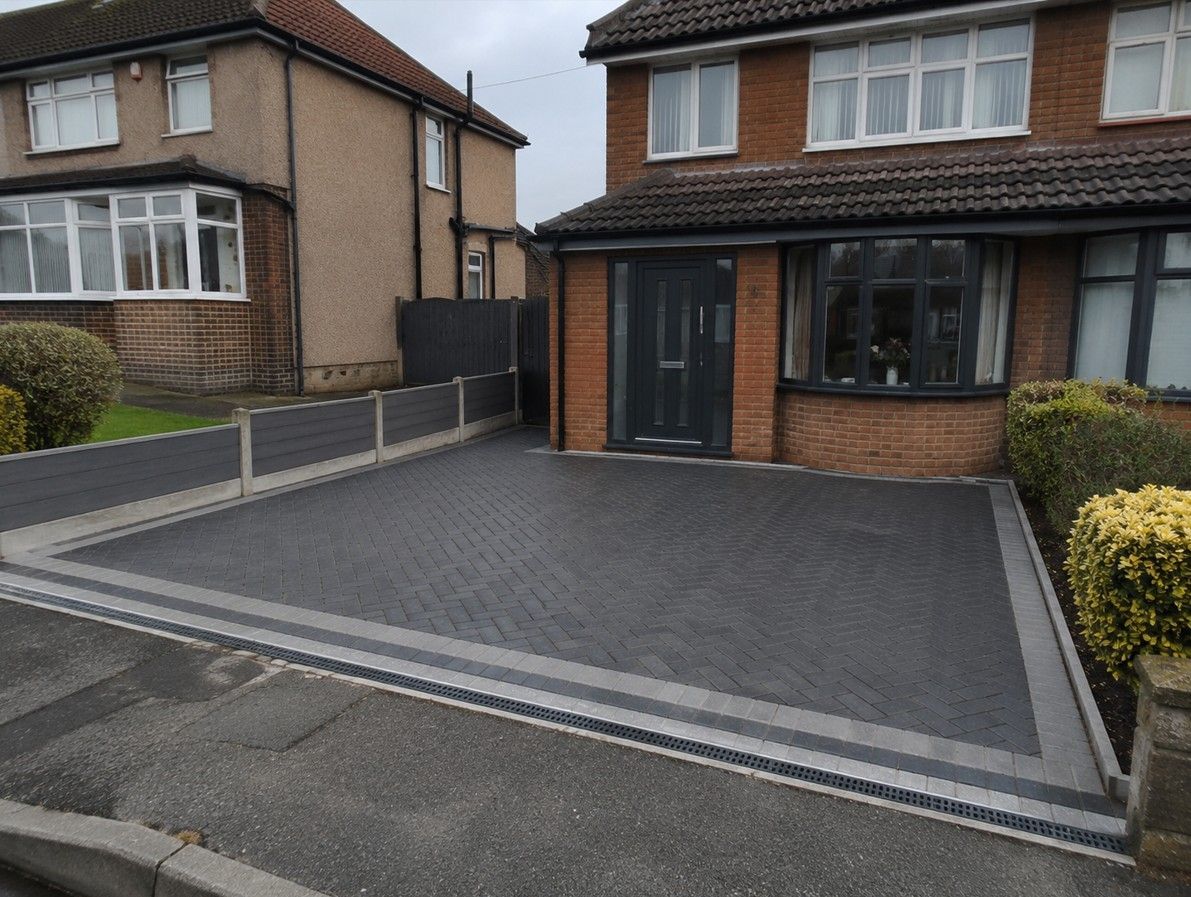 Charcoal herringbone block paving driveway at a detached family home in Treeton S60
