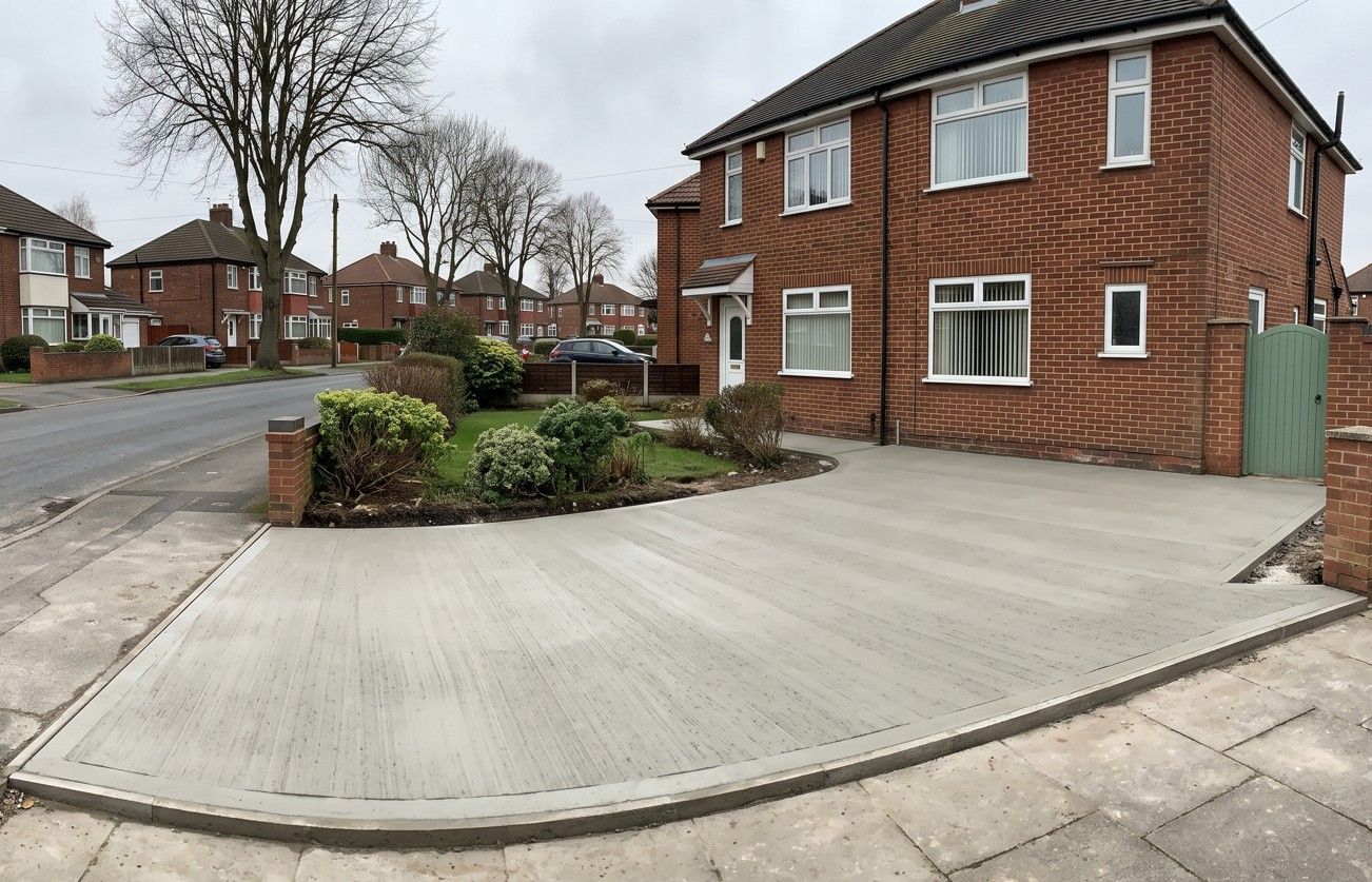 Newly completed brushed concrete driveway at a detached property in Treeton South Yorkshire