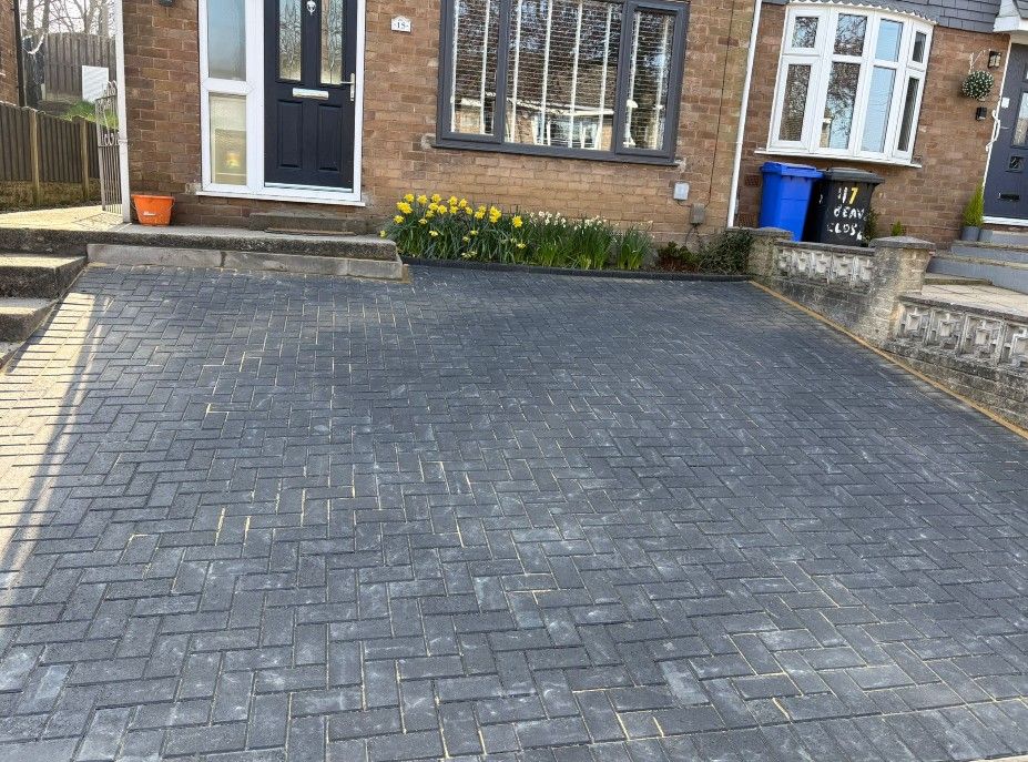 Charcoal block paving driveway sanded in