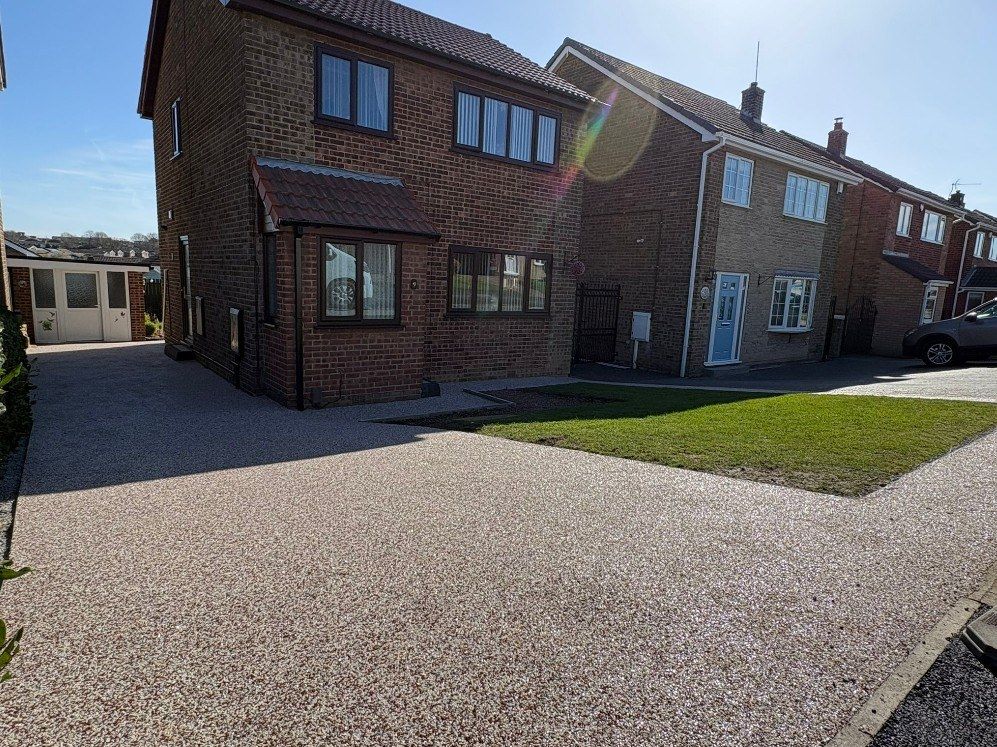 Resin bound driveway and lawn at a detached house in Mexborough
