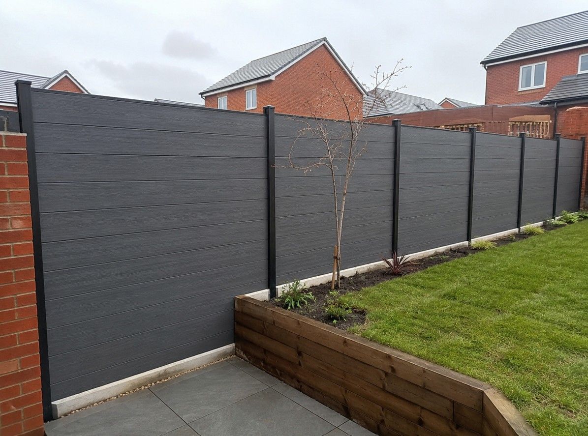 Newly installed composite garden fence with metal posts at a residential property in Rotherham