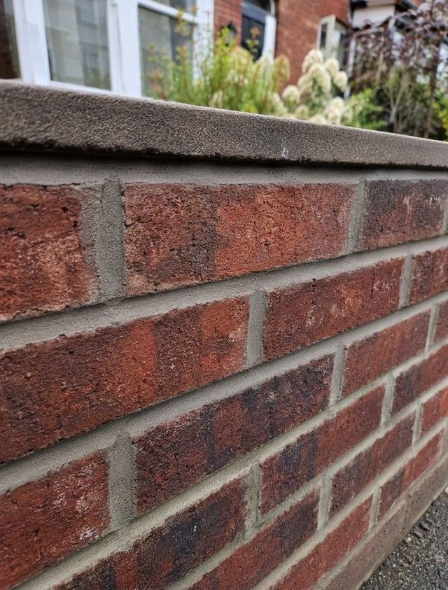 Repointed brick garden wall